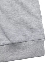 Gray sweater with ribbed hem detail.
