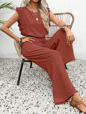 Terracotta textured jumpsuit with ruffle lace sleeves and drawstring waist