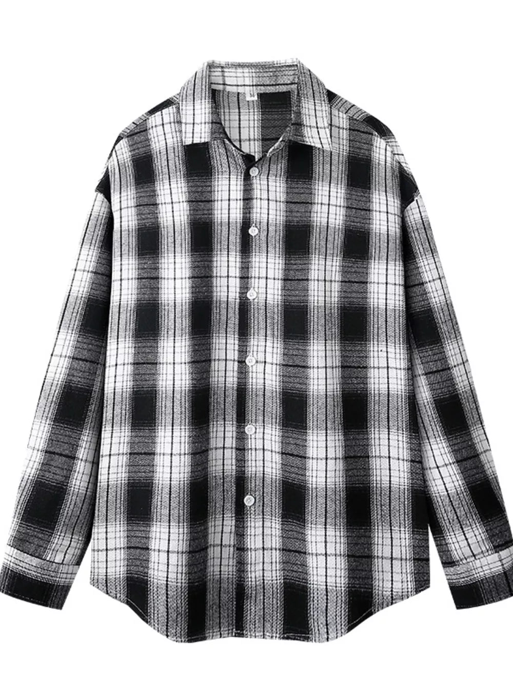 Relaxed fit cotton button-up shirt in Black And White Grid plaid with a collared neckline.