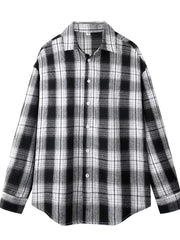 Relaxed fit cotton button-up shirt in Black And White Grid plaid with a collared neckline.
