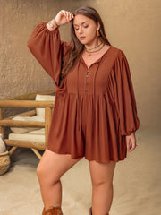 Caramel tiered romper with voluminous sleeves, buttoned v-neck and tie detail.