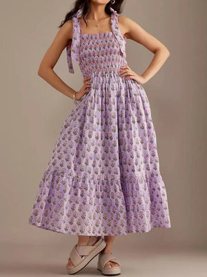 Lilac floral midi dress with smocked bodice and tie shoulders