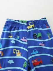 Blue cotton toddler shorts with playful vehicle print and elastic waistband