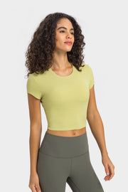 Ribbed crewneck crop top in lemon with short sleeves.