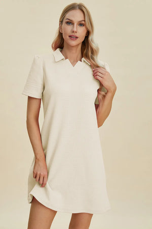 Ivory textured V-neck short sleeve mini dress with geometric pattern