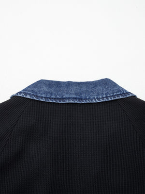 Black textured knit polo top with denim collar detail