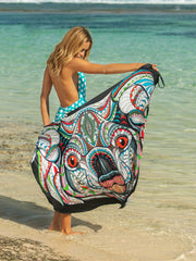 Pareo wrap with multicolor abstract owl graphic print and black trim.