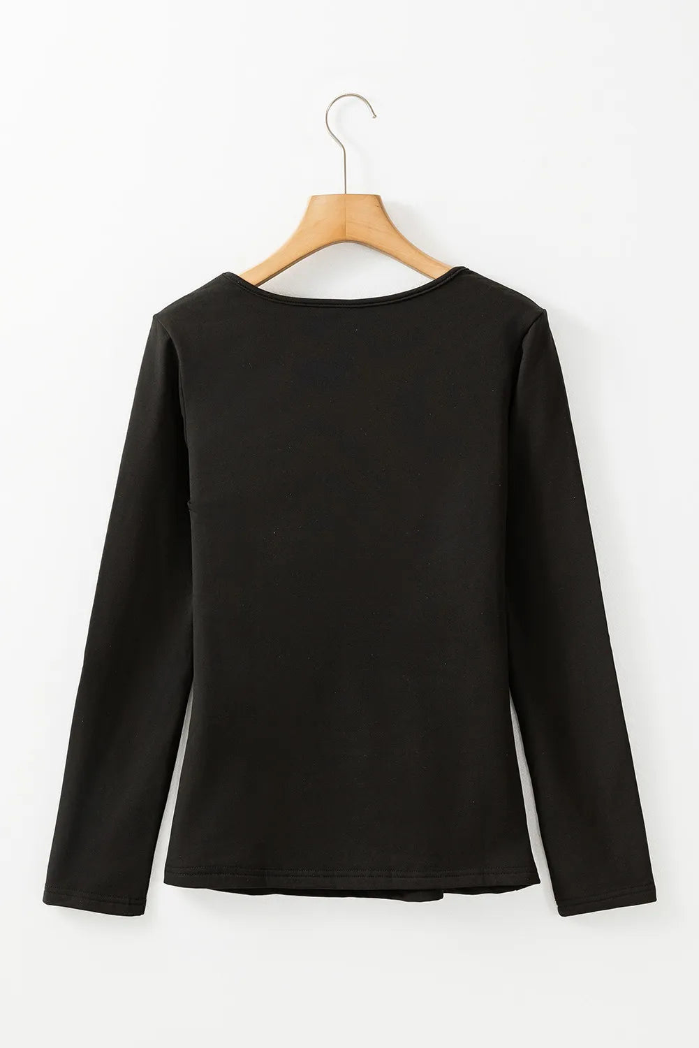 Black long sleeve thermal top with a scoop neckline.