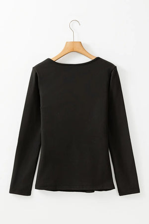 Black long sleeve thermal top with a scoop neckline.