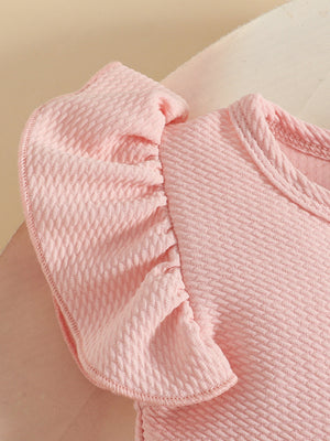 Pink baby dress with textured fabric and ruffled sleeves