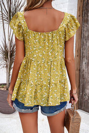 Chartreuse floral peplum blouse with flutter sleeves and tiered hem.
