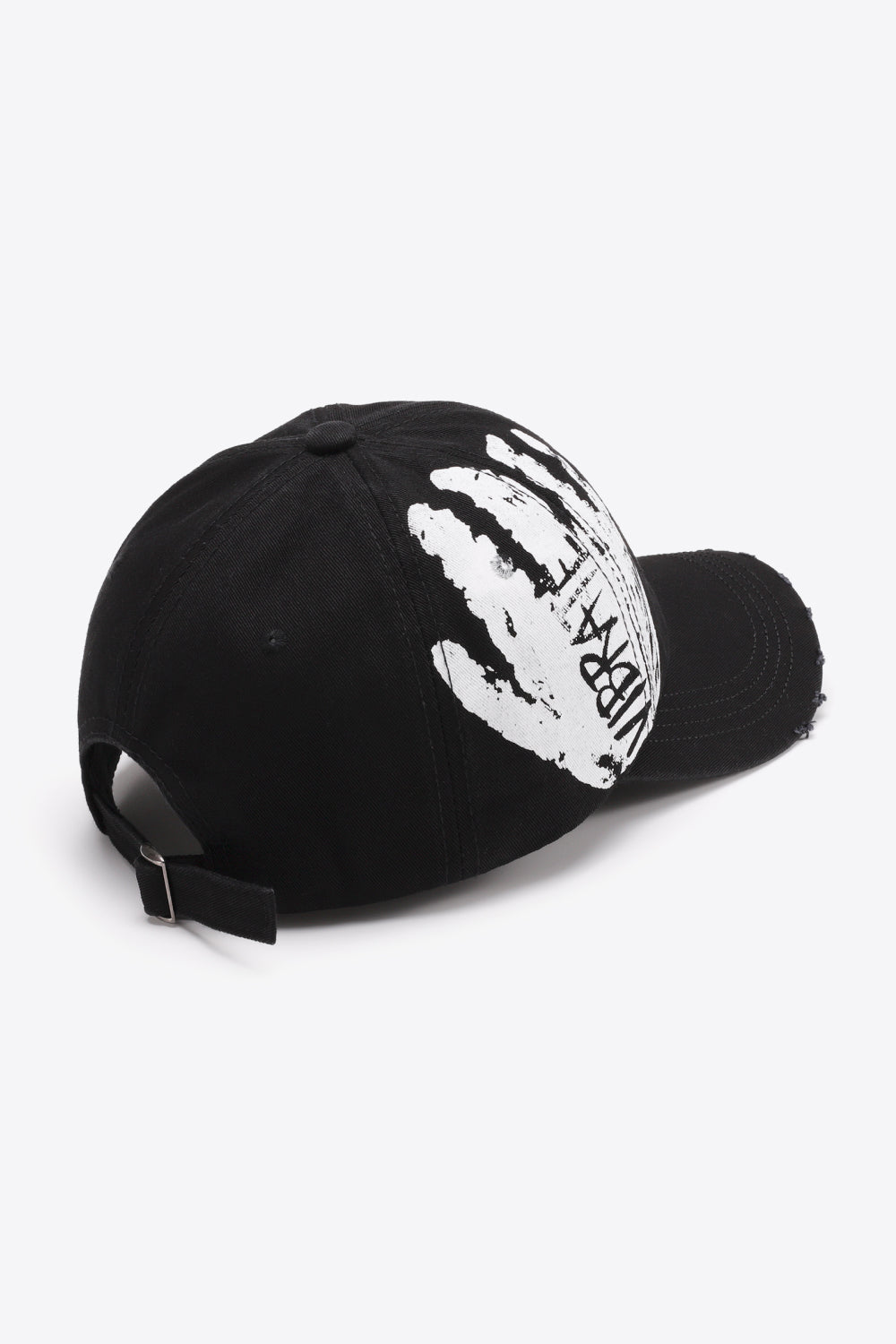 Black baseball cap with white graffiti hand print and VIBRA text, adjustable strap.