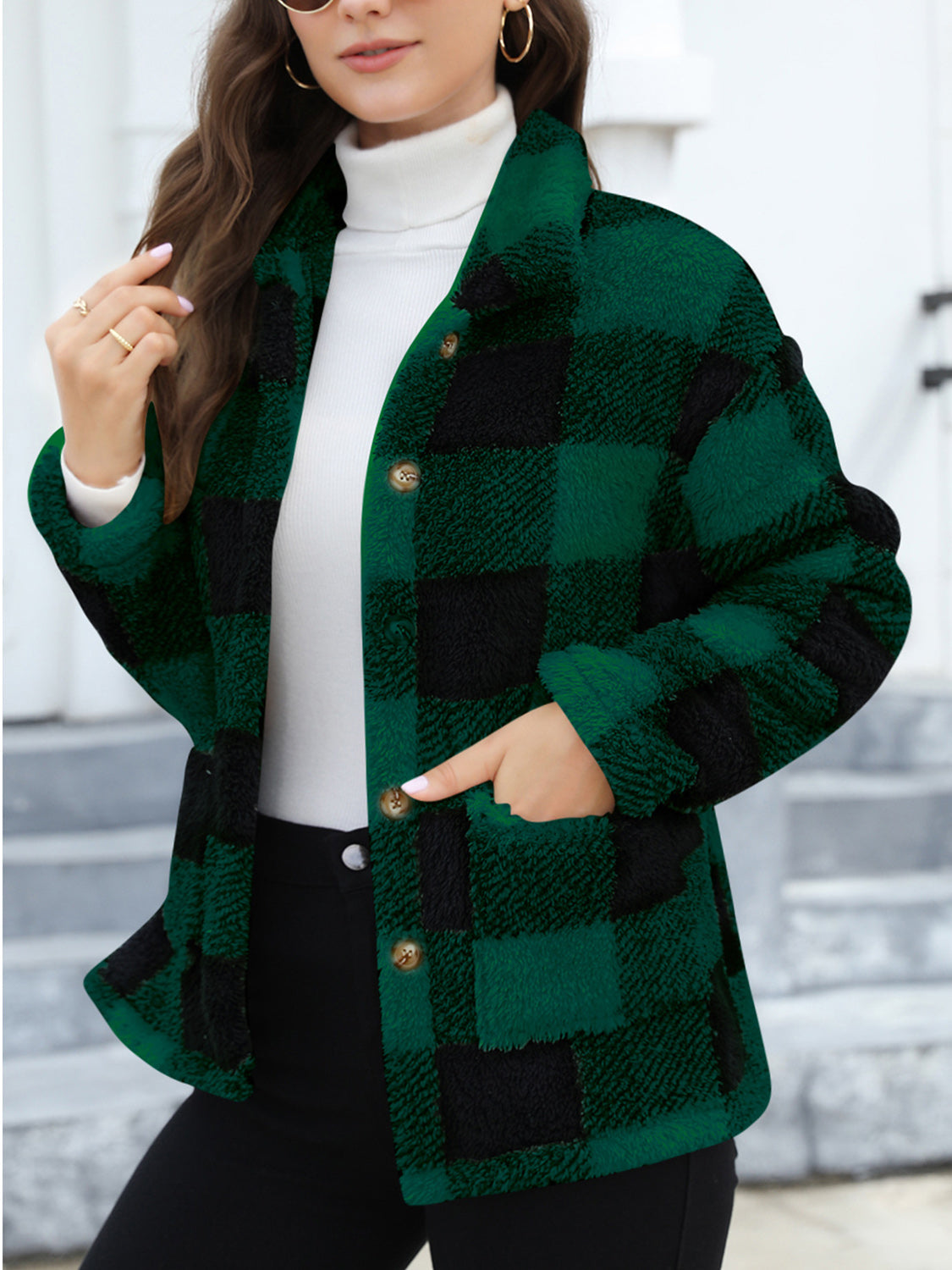 Plaid sherpa overshirt jacket in dark green and black with button front and pockets.