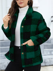 Plaid sherpa overshirt jacket in dark green and black with button front and pockets.