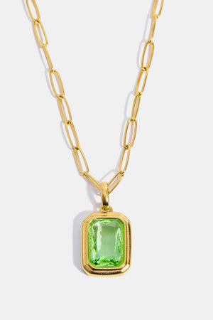 Gilded Prism Pendant Necklace with light green emerald-cut stone and 18K gold chain.