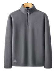 Men's gray fleece quarter zip sweatshirt with a small embroidered logo on the hem.
