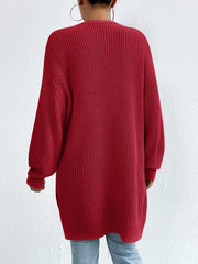 Longline knit open cardigan in Deep Red with ribbed texture and long sleeves.