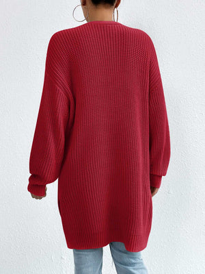 Longline knit open cardigan in Deep Red with ribbed texture and long sleeves.