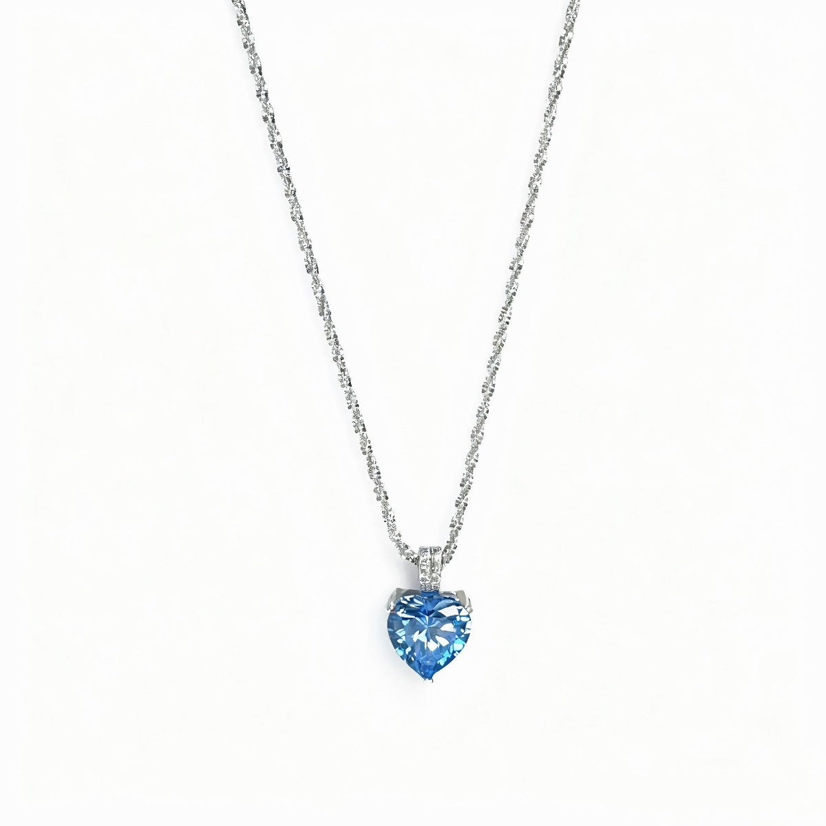 Silver necklace with blue heart pendant and delicate chain