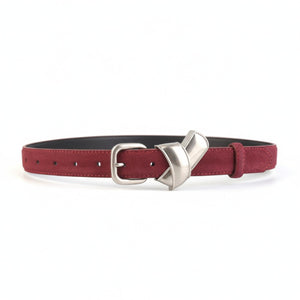 Red suede belt with sculptural silver buckle and silver buckle closure