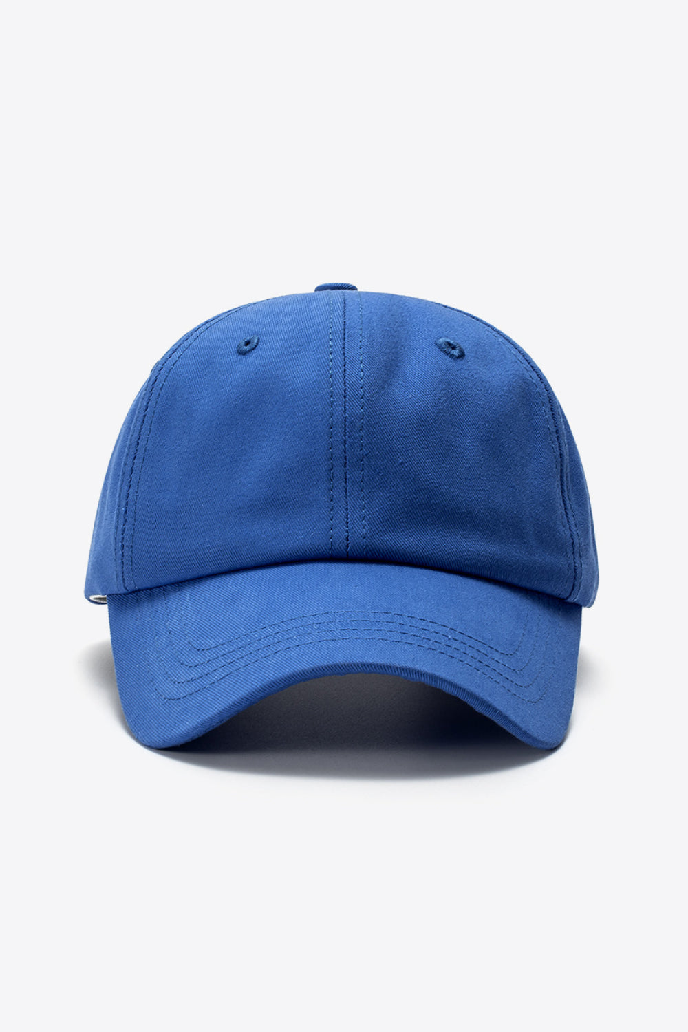 Cobalt blue cotton baseball cap with stitched details and curved brim.