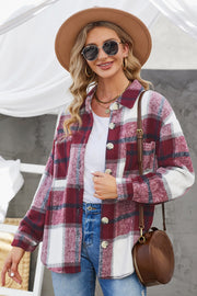 Oversized shacket in Burgundy plaid with button-down front and patch pocket.
