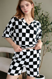 Black and white checkered v-neck t-shirt and shorts outfit set