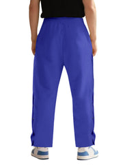 Men's royal blue track pants with side snap buttons and a relaxed fit.