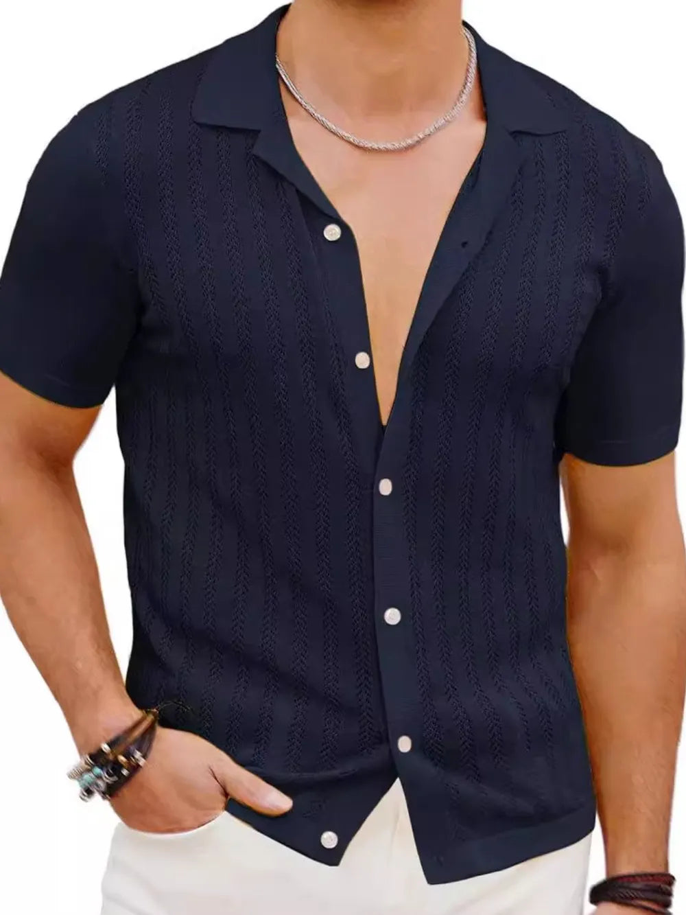 Navy mesh button-up shirt with short sleeves and a textured pattern.