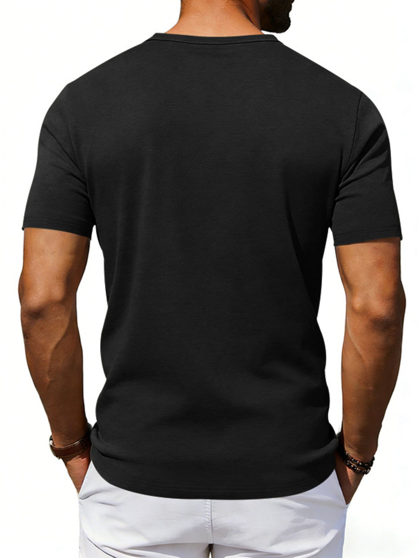 Black cotton blend tee with scoop neck and short sleeves.