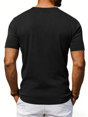 Black cotton blend tee with scoop neck and short sleeves.