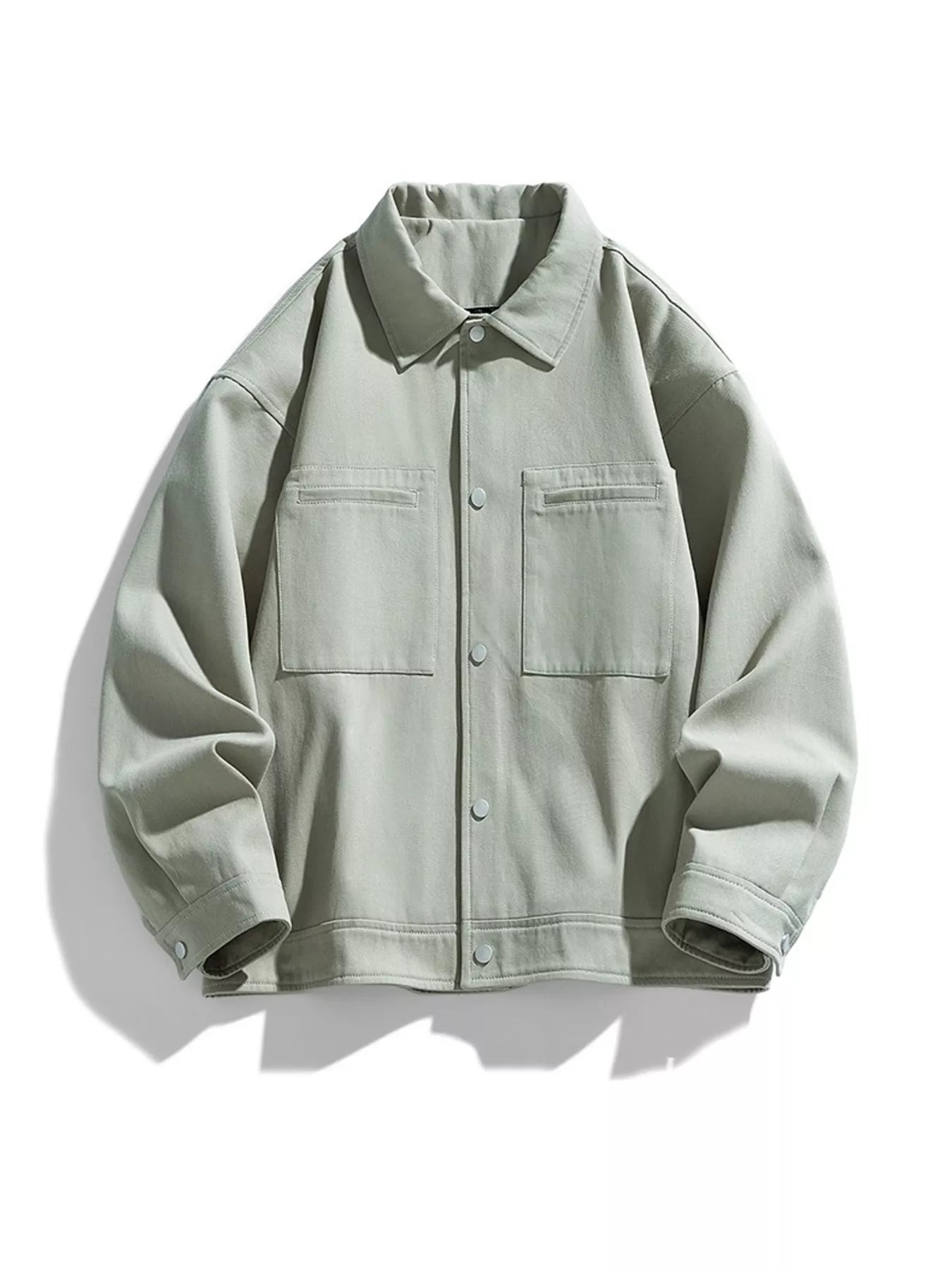 Oversized casual snap jacket in Salt Gray Green with two chest pockets and snap button closure.