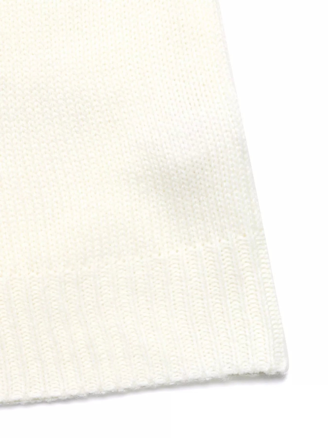 White acrylic knit sweater with ribbed hem detail