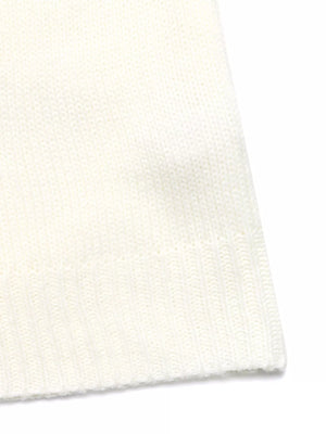 White acrylic knit sweater with ribbed hem detail