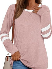 Heathered dusty pink long sleeve t-shirt with white striped sleeves and a white crew neck.