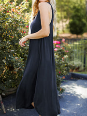 Dark blue tank midi dress with asymmetrical hemline and scoop neck.