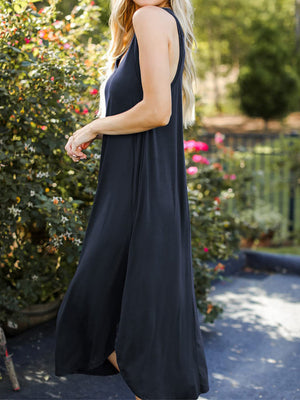 Dark blue tank midi dress with asymmetrical hemline and scoop neck.