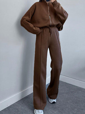 Sporty chic zip-up coord set in coffee brown with drawstring waist pants and a zip-front hoodie.