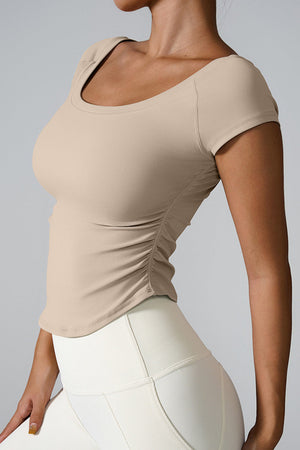 Sand performance tee with gathered side detail and scoop neck