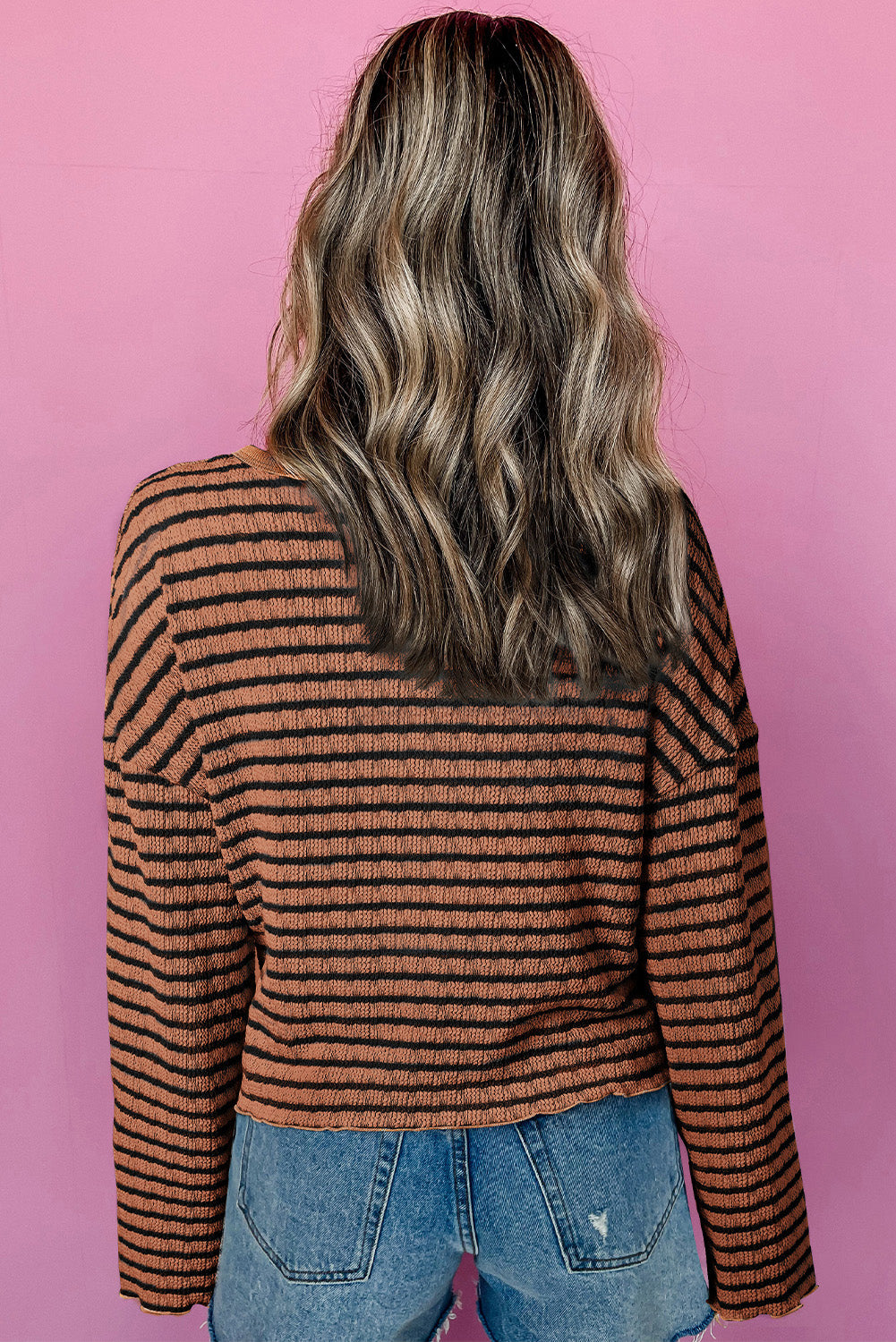 Textured Henley stripe knit top in caramel with black stripes, crew neck, long sleeves.