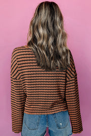 Textured Henley stripe knit top in caramel with black stripes, crew neck, long sleeves.