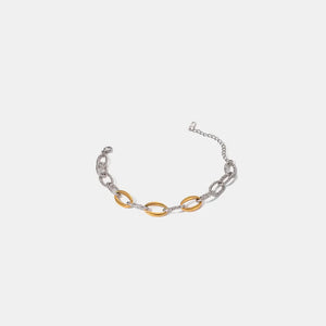 Two-tone link bracelet with oval gold accents and silver chain, 18K gold-plated.