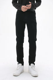 Black slim-fit stretch denim trousers with a casual cut.