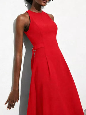 Red A-line midi dress with high neckline, defined waist, and gold ring detail.