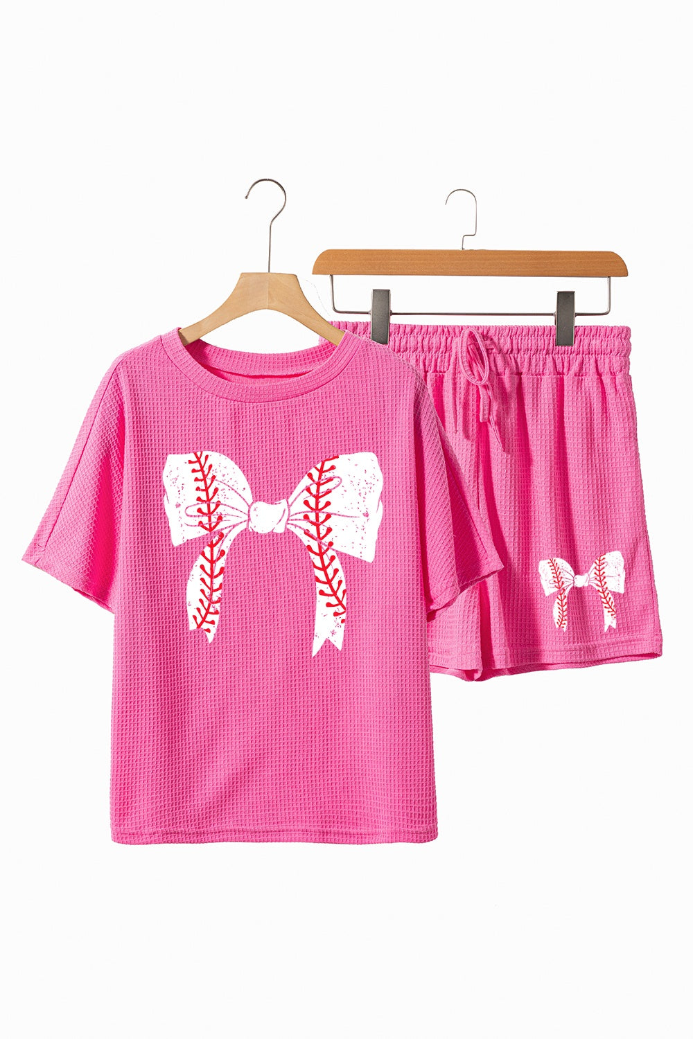Hot pink waffle knit loungewear set with baseball bow graphic on tee and shorts.