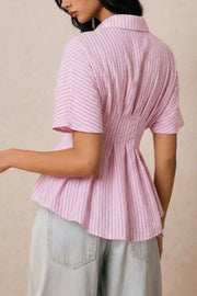 Blush pink striped peplum maternity blouse with short sleeves and button detail