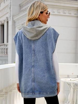 Sleeveless denim utility vest with grey hood in dark wash.