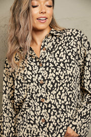 Black abstract spot print oversized shirt with button front and collar.