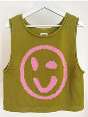 Olive knit tank top with pink smiley face graphic.