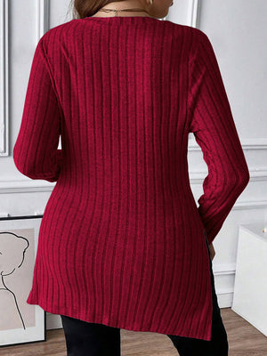 Burgundy ribbed knit tunic with square neckline and long sleeves.